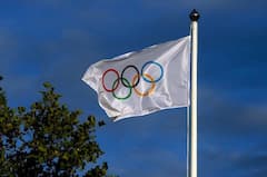 Eine Flagge mit den olympischen Ringen.
