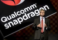 Qualcomm-CEO Steve Mollenkopf vor dem Qualcomm-Snapdragon-Logo